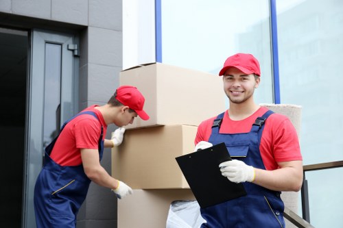 Careful packing of fragile household items in Marylebone