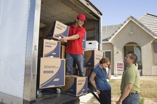 Boxed household items ready for a cubic-yard style removal estimate