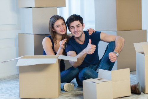 Packed moving boxes and furniture prepared for a Marylebone home move