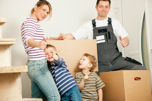 Packed furniture being loaded into a removals truck in Marylebone