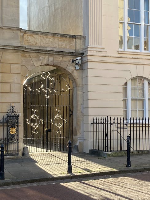 Photograph of a historic three-story building on a city street, with a corner façade displaying signage indicating 'The Marylebone' and the address number 98. The building features large windows on t